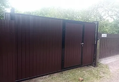 Откатные ворота с встроенной калиткой